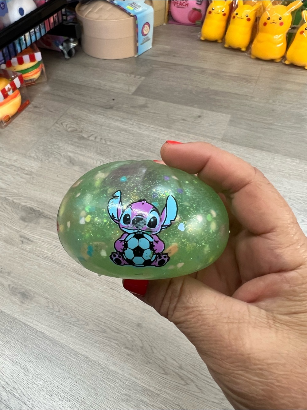 Green Glitter Stretchy Squeeze Toy with Cartoon Stitch Design - dumpling